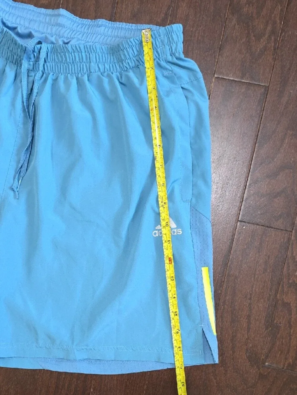 adidas Men's Light Blue Athletic Shorts with Yellow Accent